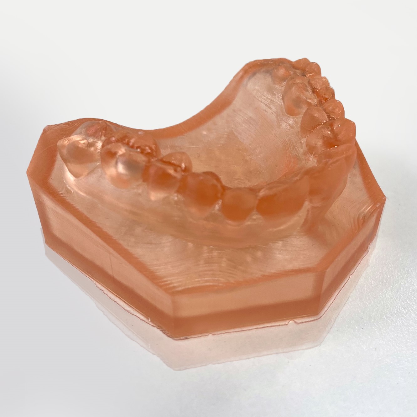 A 3D printed biocompatible dental part. Photo via PostProcess Technologies.
