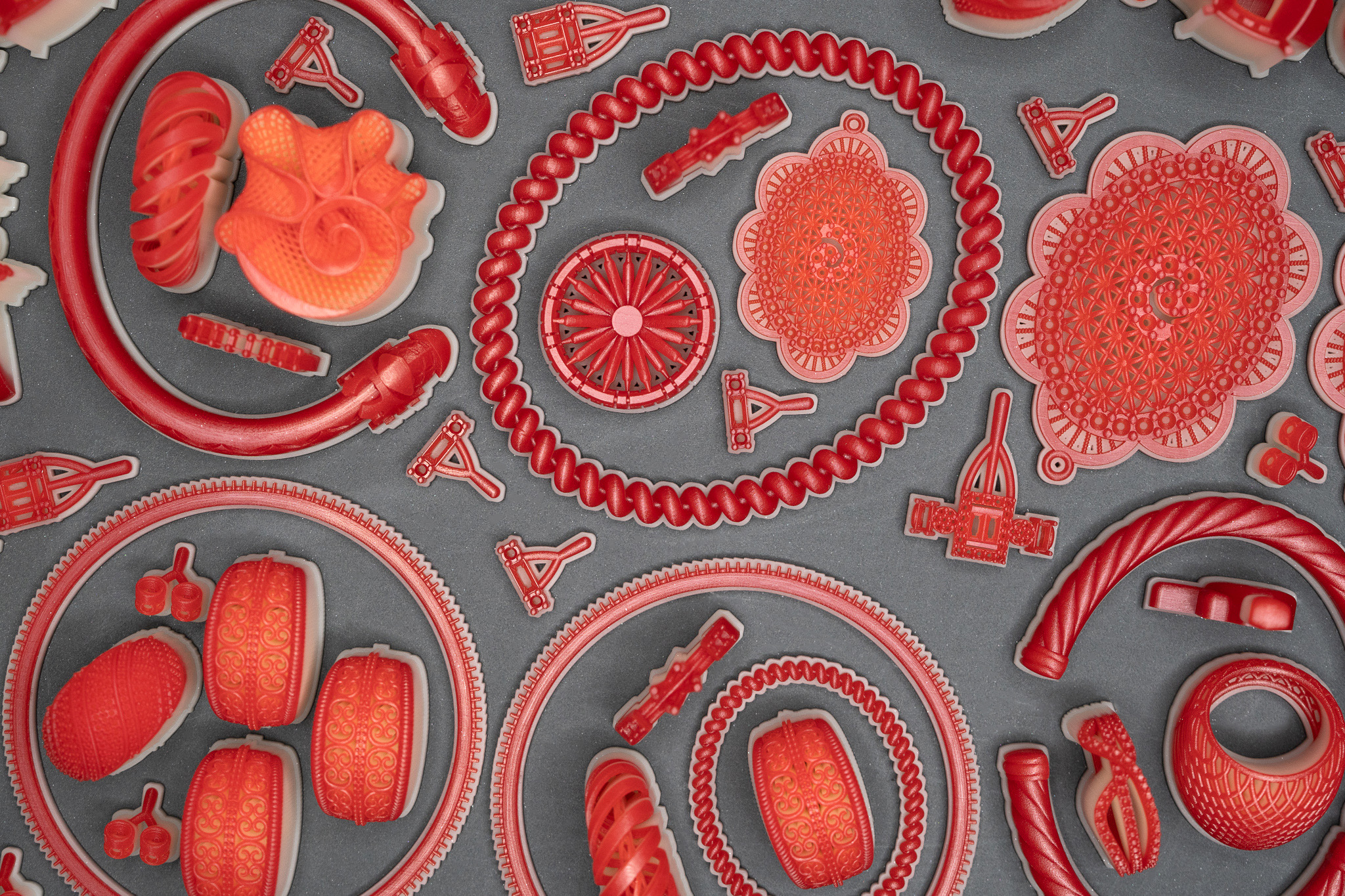 Bird's eye view of 3D printed parts in VisiJet Wax Jewel Red.  Photo via 3D systems.