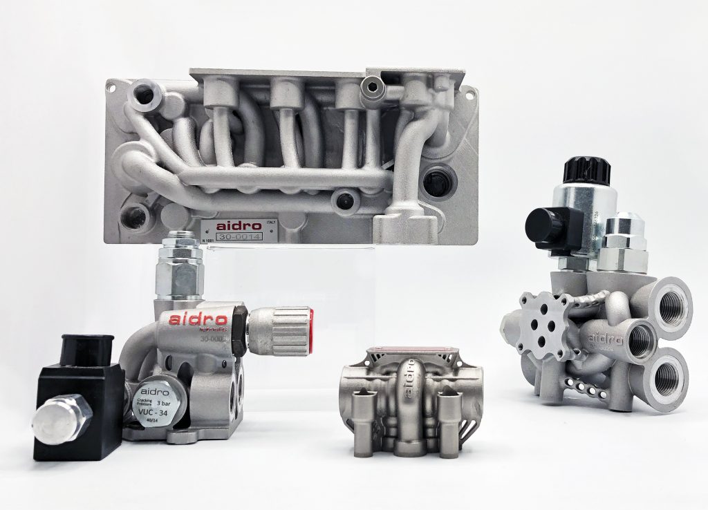 A selection of Aidro 3D printed hydraulic parts. Image via Aidro. 