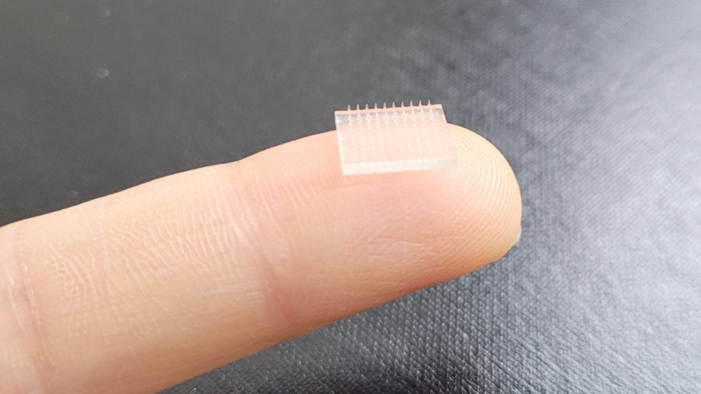 Researchers at Stanford University and UNC use 3D printing to create a microneedle vaccine patch.  Photo by UNC.