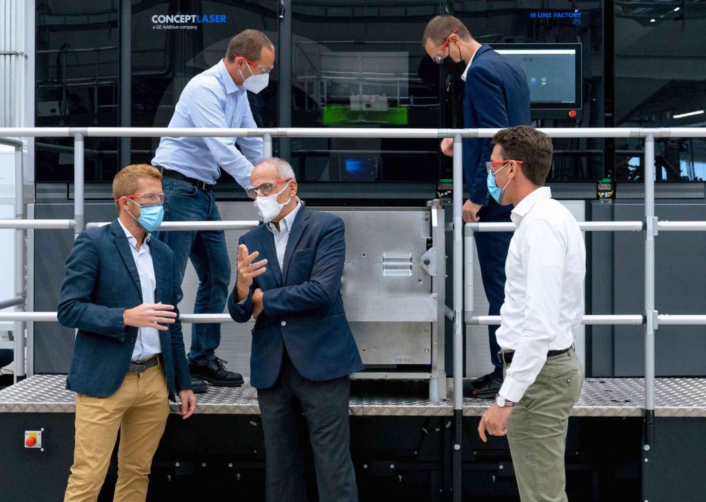 BEAMIT GM Andrea Scanavini (back right) visiting a GE Additive facility.