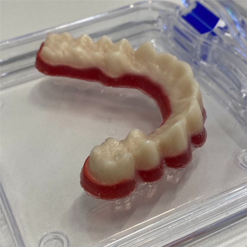 A 3D printed dental part showcased at Formnext 2021. Photo via Quantica.