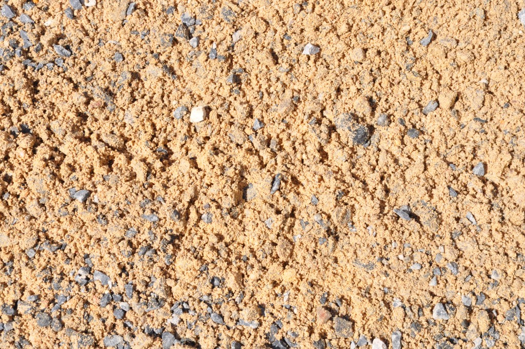 Conventional concrete mixes require gravel and sand as aggregates if they're to be used for load-bearing applications. Photo via Parklea Sand and Soil.