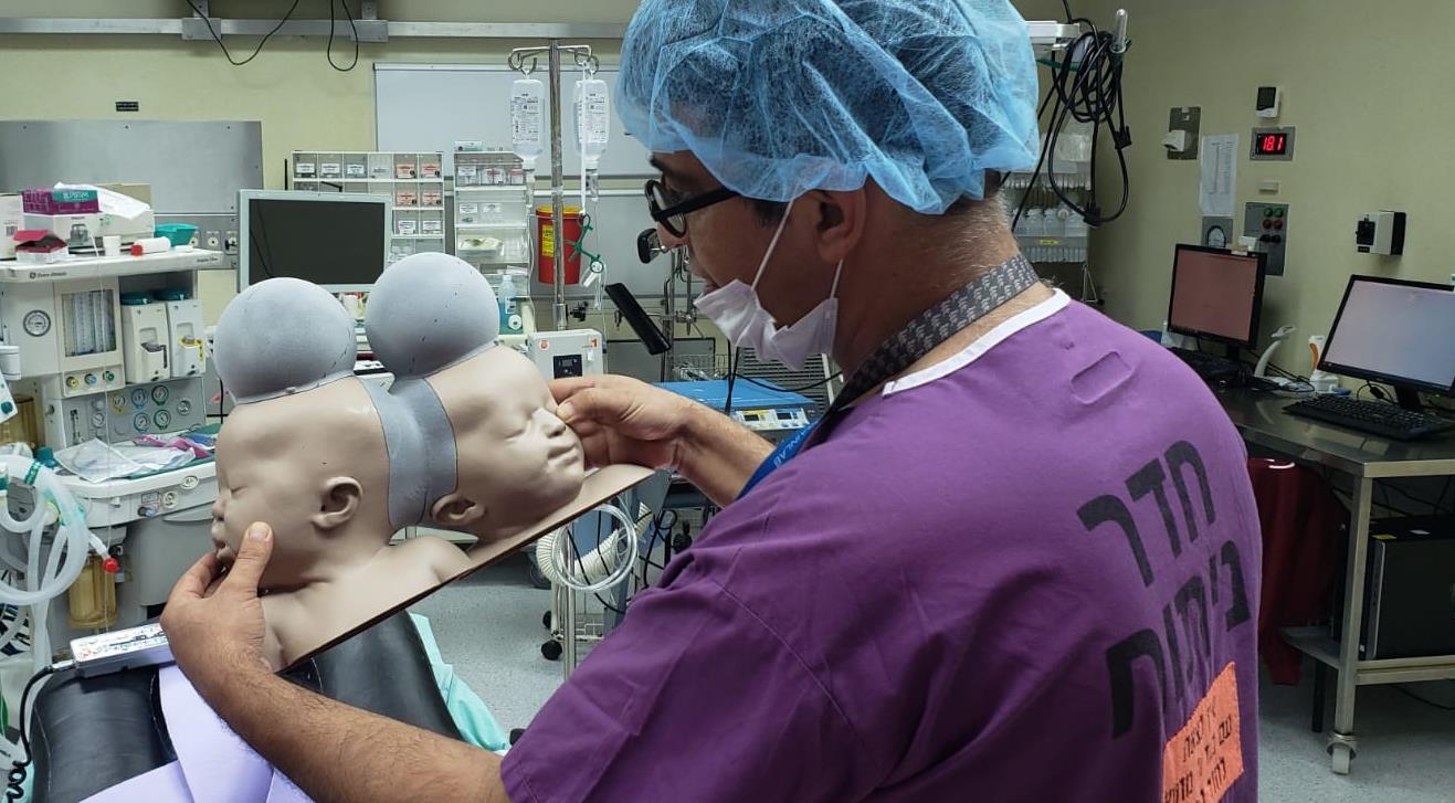 The 3D printed models were used by surgeons to practice the complex surgey. Photo via LMI.