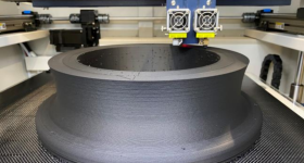3D Metalforge printers printing a large format part in PACF. Photo via 3D Metalforge.