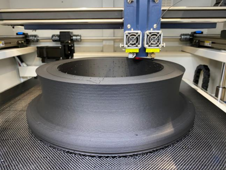 3D Metalforge printers printing a large format part in PACF. Photo via 3D Metalforge.