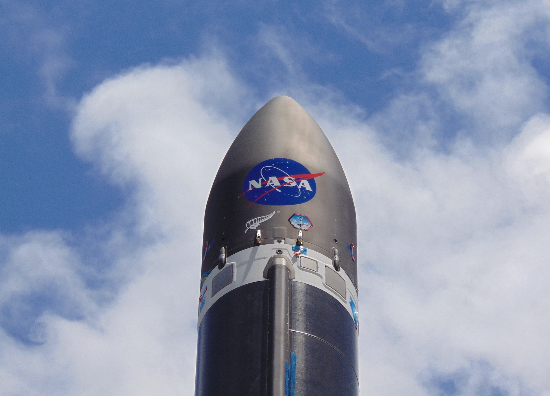 A NASA logo on top of a hypothetical VADR rocket design.