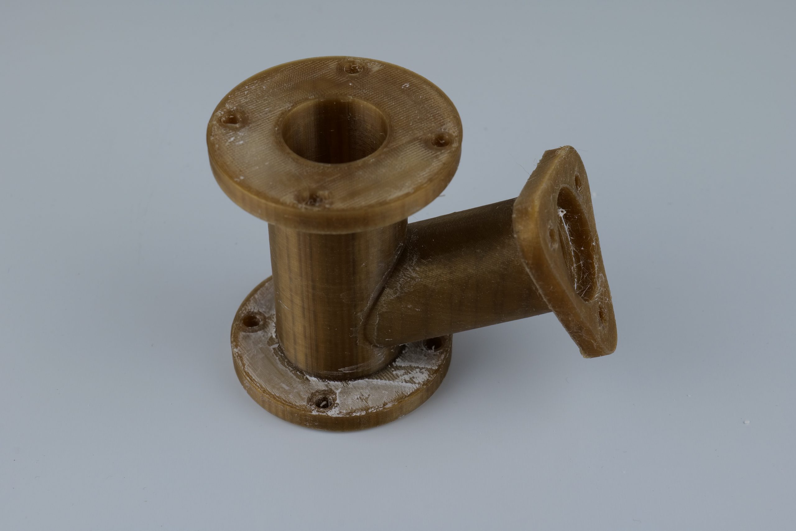 PEEK print tests: turbine, pipe, bevel gear. Photos by 3D Printing Industry.