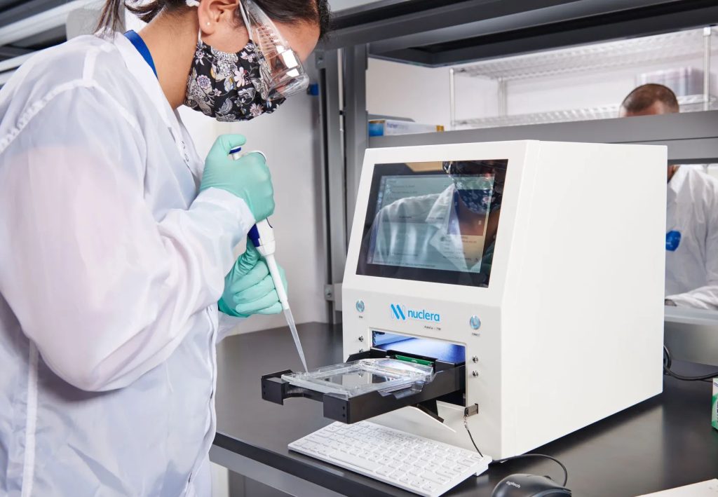 An engineer using Nuclera's 3D bioprinter. 