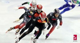 The Chinese short track speed skating team taking gold. Photo via China's CGTN state news service.