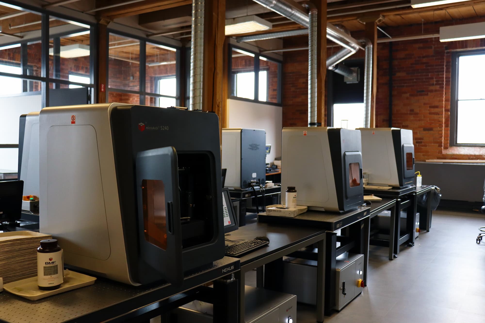 BMF 3D printers at the firm's new facility. Photo via BMF.