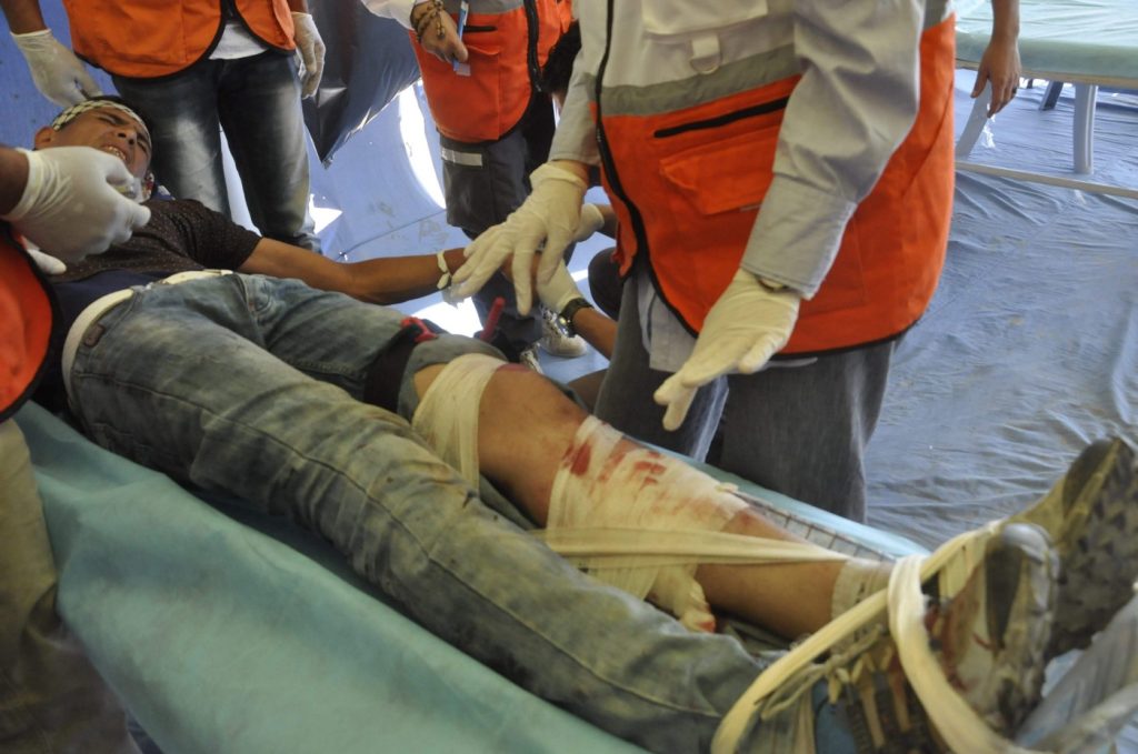 A wounded protestor in Gaza with a Glia Gaza Tourniquet in place.