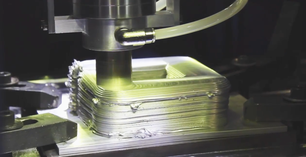 The patented MELD solid-state process. Photo via MELD Manufacturing.
