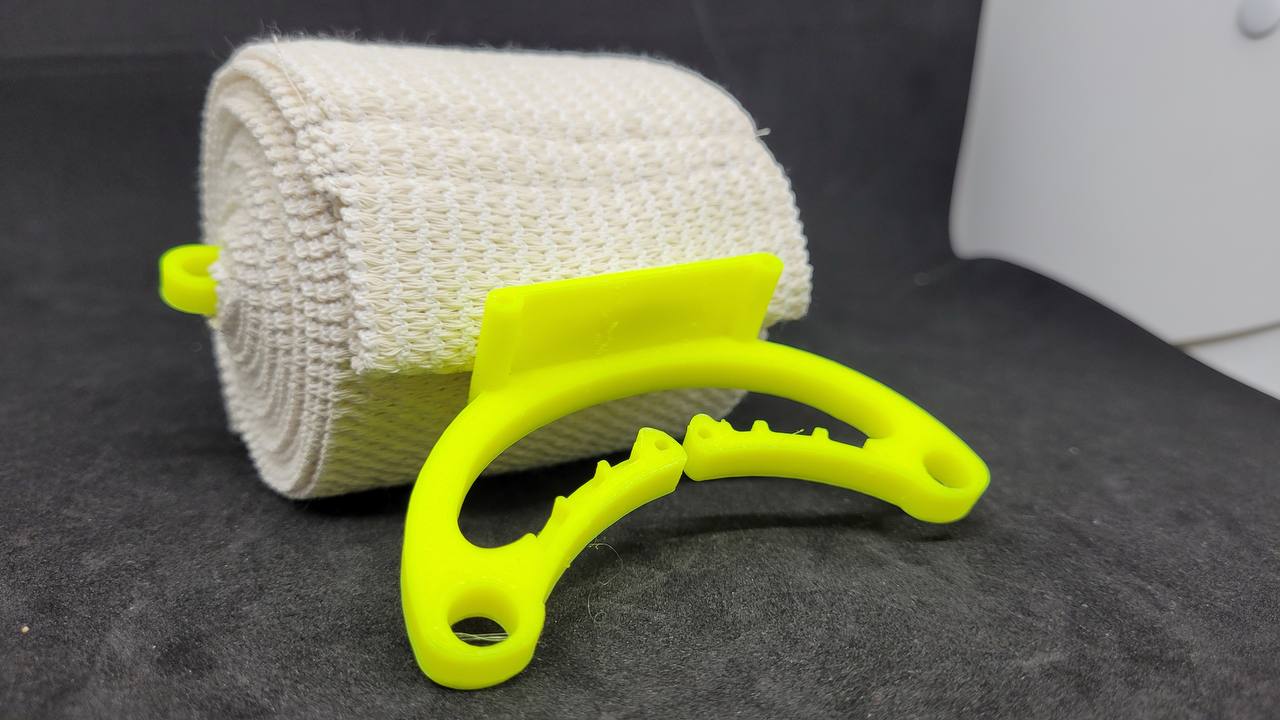 A 3D printed quick bandage applier. Photo via Sygnis