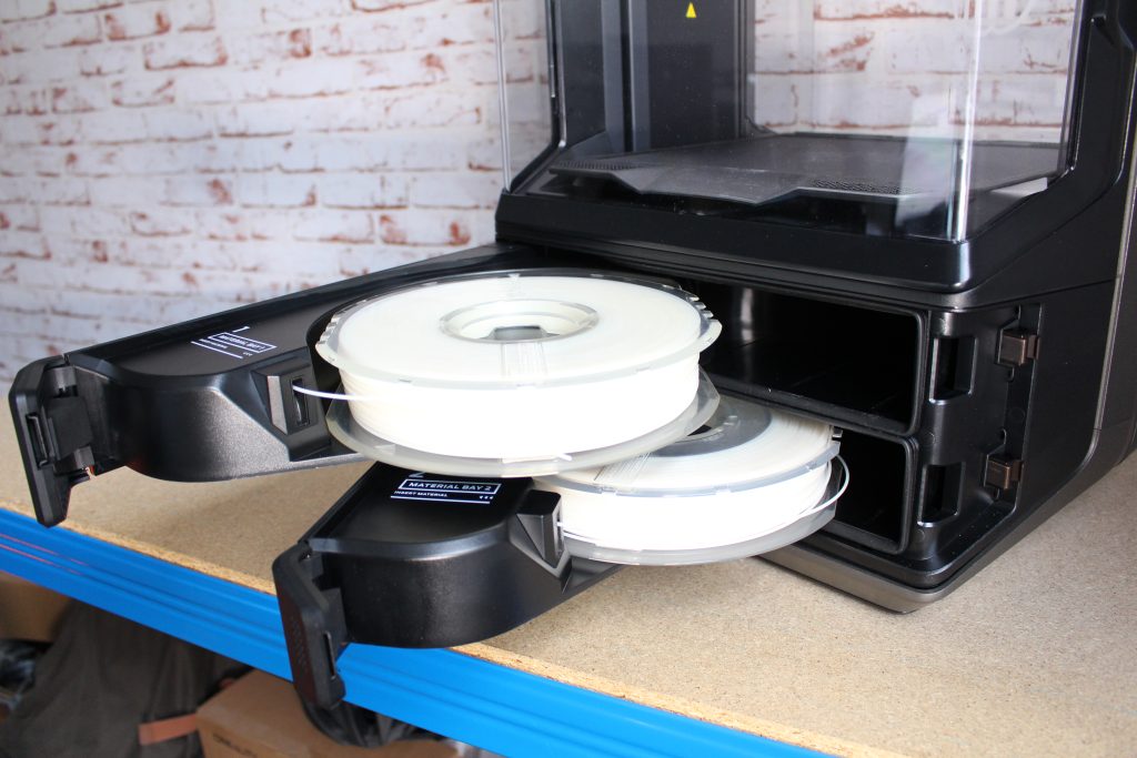 The default extruders and filament storage chamber. Photos by 3D Printing Industry.