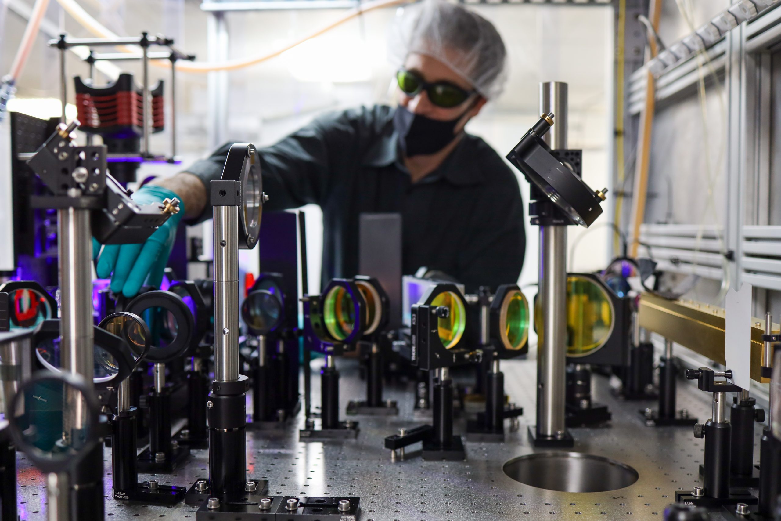 Chief Scientist Andy Bayramian adjusts waveplate to complete optics upgrade on Seurat's R&D system. Photo via Seurat Technologies.