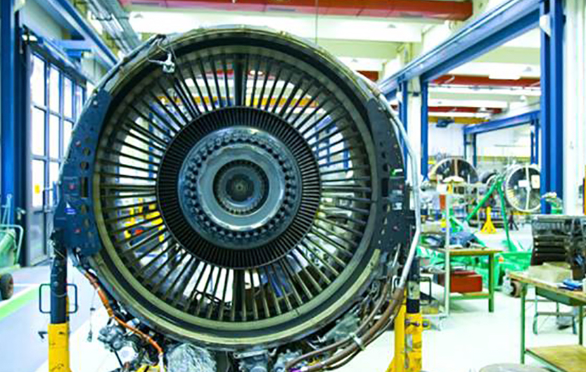 Pièces de moteur d'avion en cours de développement dans l'une des installations d'ITT.  Photo via ITT. 