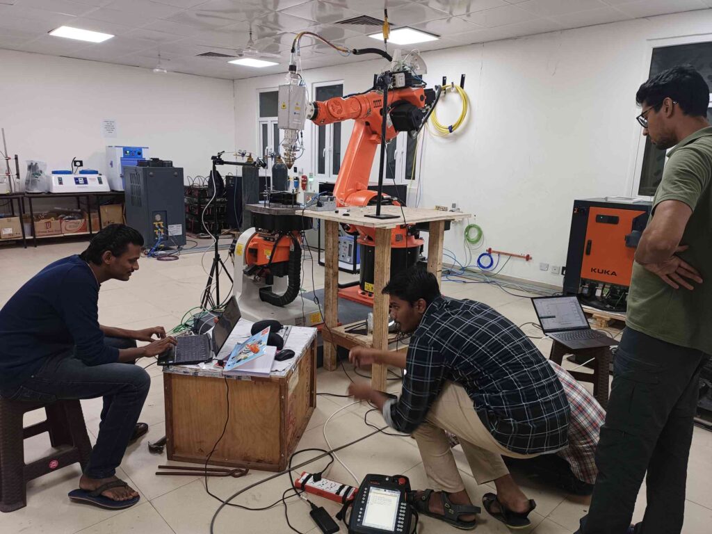 IIT testing the metal 3D printer. Photo via IIT Jodhpur.