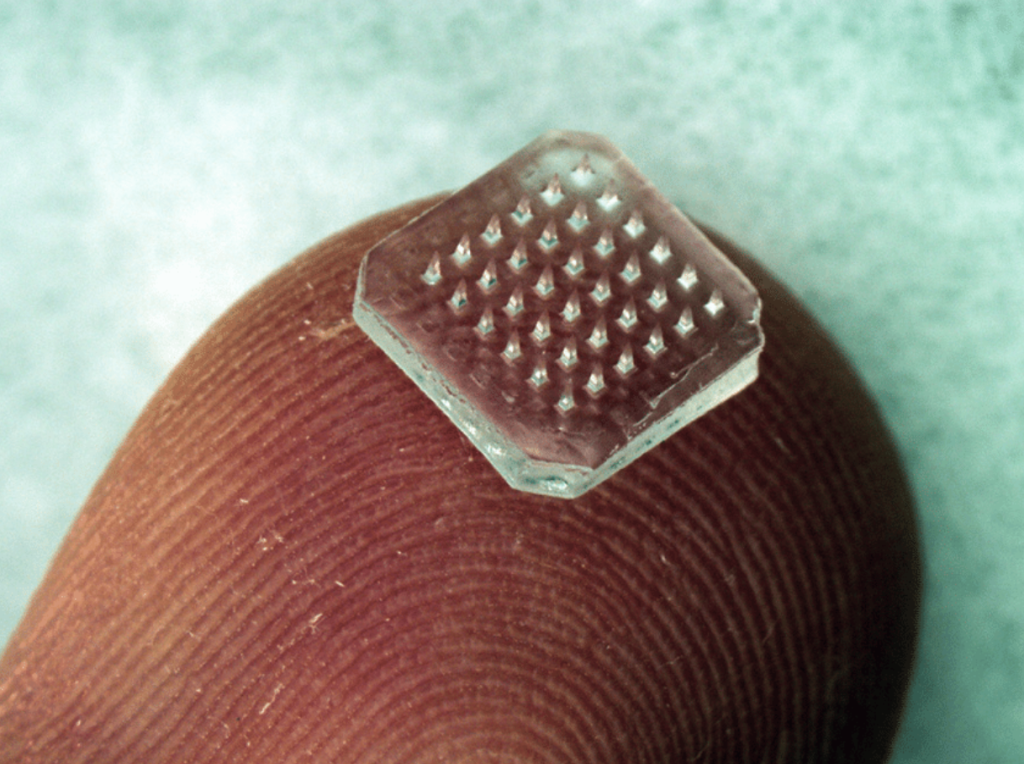 Example of a conventional microneedle patch.  Photo by Georgia Tech.