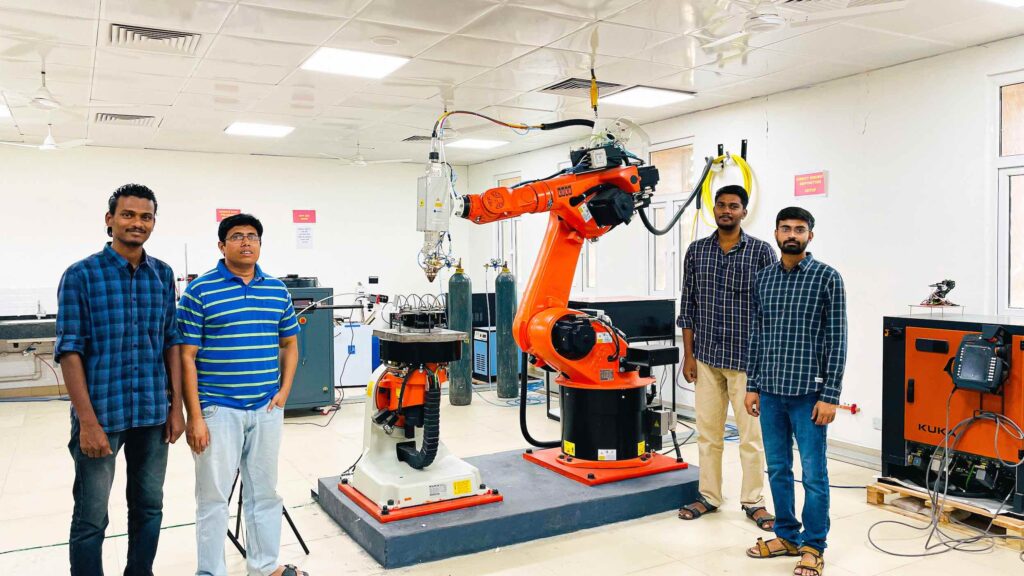 The IIT Jodhpur researchers with their self-developed DED metal 3D printer. Photo via IIT Jodhpur.
