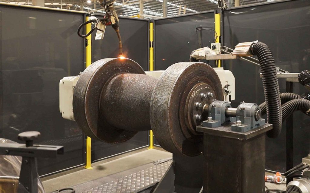 AML3D's WAM technology being used to build a large-format pipe spool last year. Photo via AML3D. 