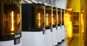 A Carbon 3D printer fleet at an Oechsler facility. Photo via Oechsler.