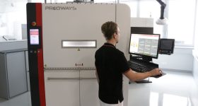 An engineer using a Prodways ProMaker P1000 3D printer. Photo via Prodways.