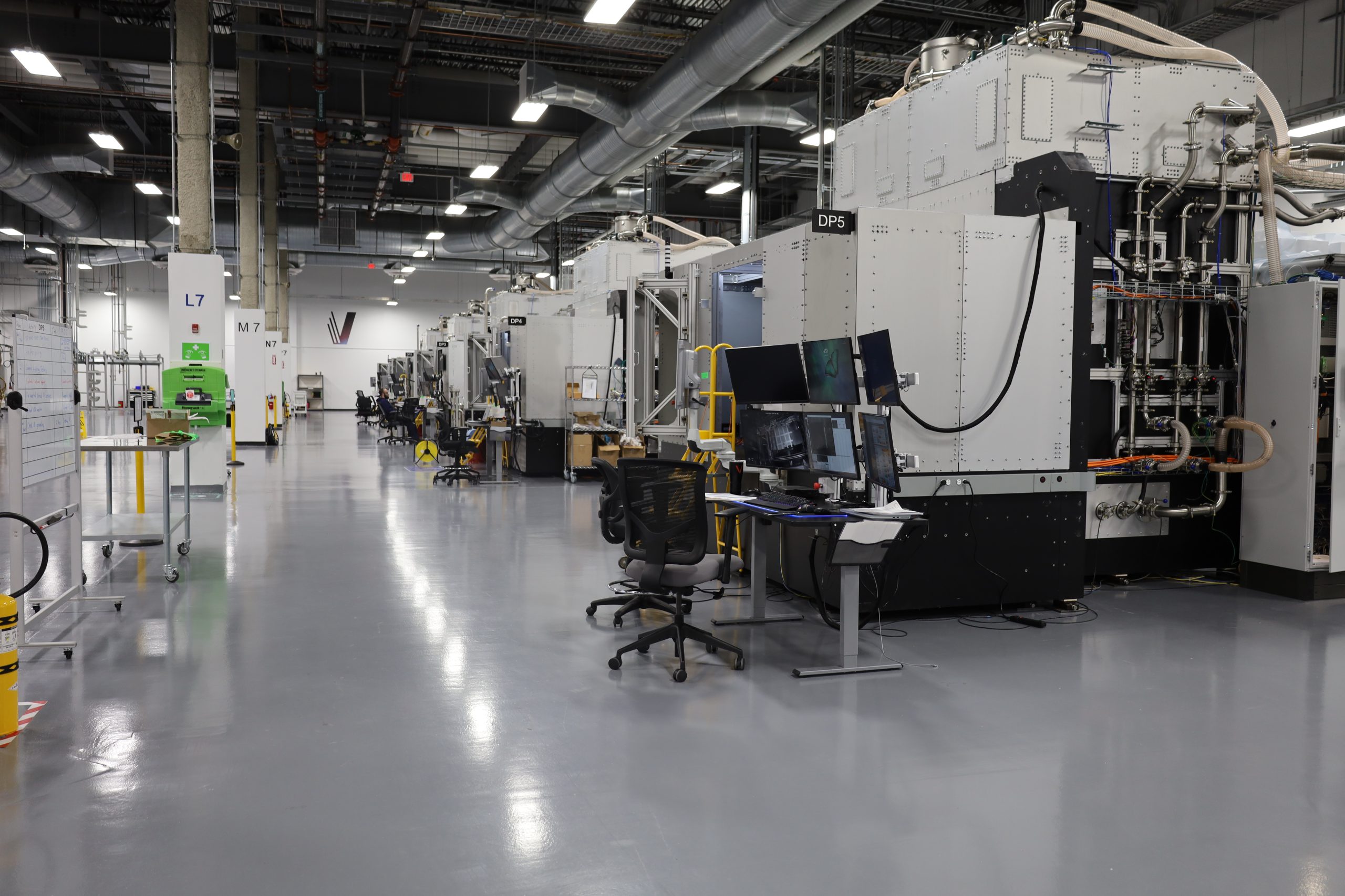 VulcanForms' new facility houses a fleet of 100kW laser 3d printing systems. Image via VulcanForms.