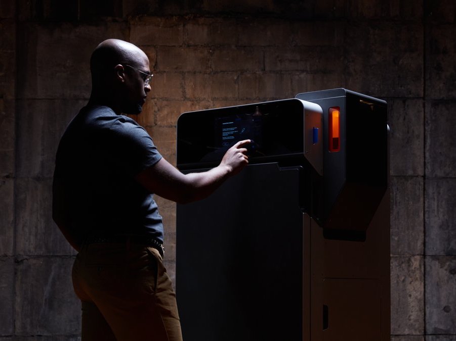 An engineer using Formlabs' new Fuse 1+ 30W 3D printer. Image via Formlabs.
