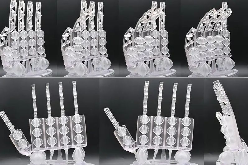 The IIT researchers' robotic handed with 3D printed GRACE actuators. Photo via IIT. 