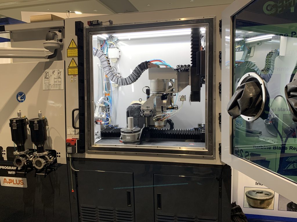 Optomec's LENS CS250 3D printer at IMTS 2022. Photo by Paul Hanaphy.