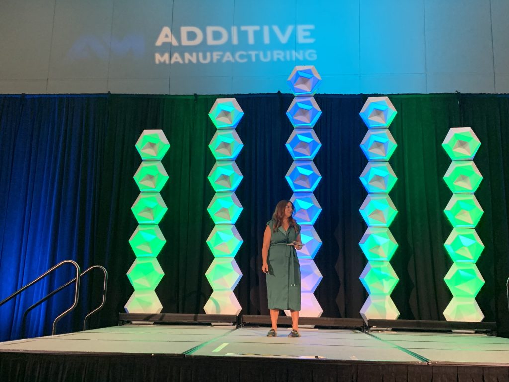 FormAlloy CEO Melanie Lang delivering her speech on DED 3D printing at IMTS 2022. Photo by Paul Hanaphy.