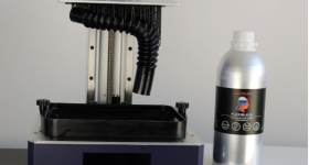 Liqcreate's Flexible-X resin alongside the Anycubic M3 Plus 3D printer. Photo via Liqcreate.