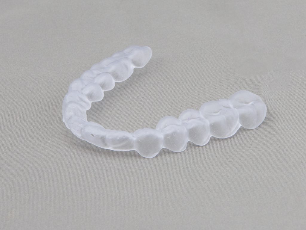 A dental aligner 3D printed from NextDent Ortho Flex on the Hunter S system. Image via FlashForge USA. 
