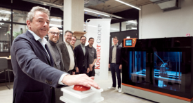 Kai Furler, CEO of the Koehler Group, symbolically pressing the start button for the development of future‐oriented prototypes on the BigRep PRO 3D printer in MakerSpace. Image via Koehler Group.