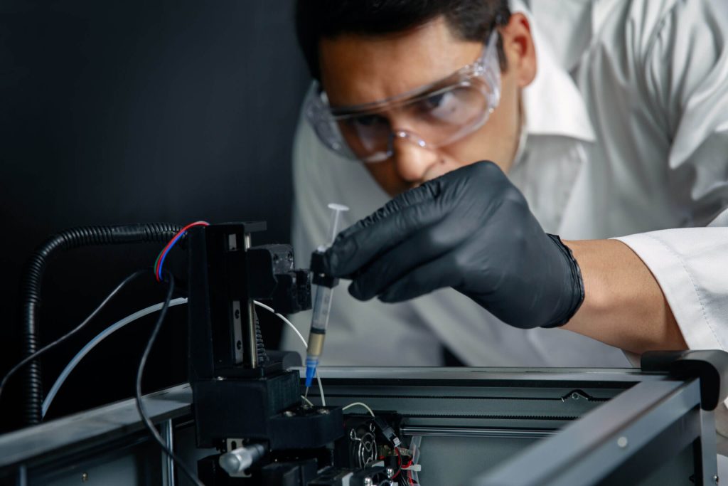 A nano3Dprint engineer calibrating one of its machines. Photo via nano3Dprint. 