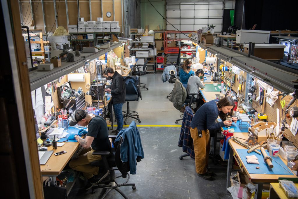 The Pinocchio fabrication team hard at work. Photo via Jason Schmidt, Netflix.
