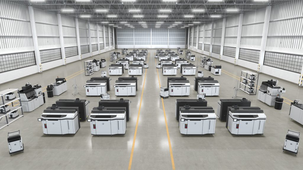 A fleet of industrial 3D printers on the production floor – HP Jet Fusion 5200. Photo via HP.