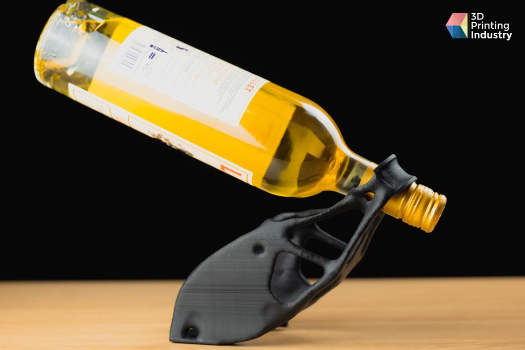 A Nexa3D XiP-3D printed wine bottle holder. Photo by 3D Printing Industry.