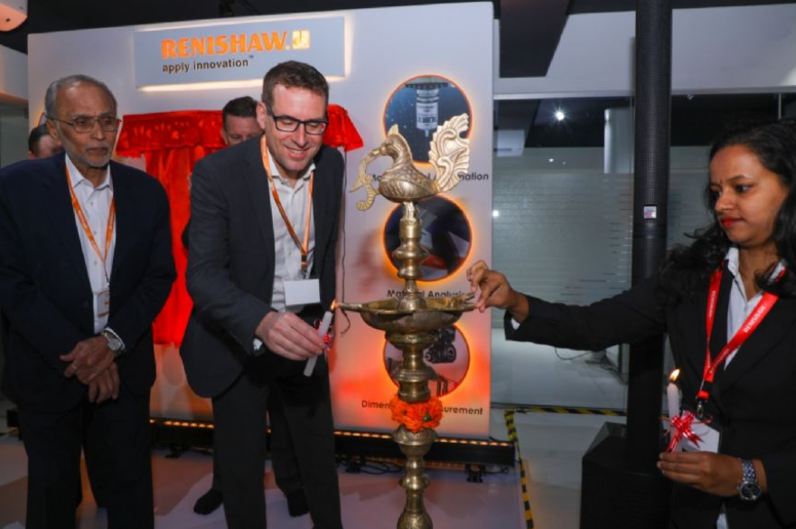 The lighting of a traditional Indian Samai lamp at the official opening of Renishaw’s new Technology Centre in Bangalore. Image via Renishaw.