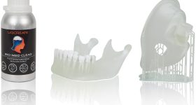 The new Liqcreate Bio-Med Clear resin alongside biocompatible 3D printed parts. Image via Liqcreate.