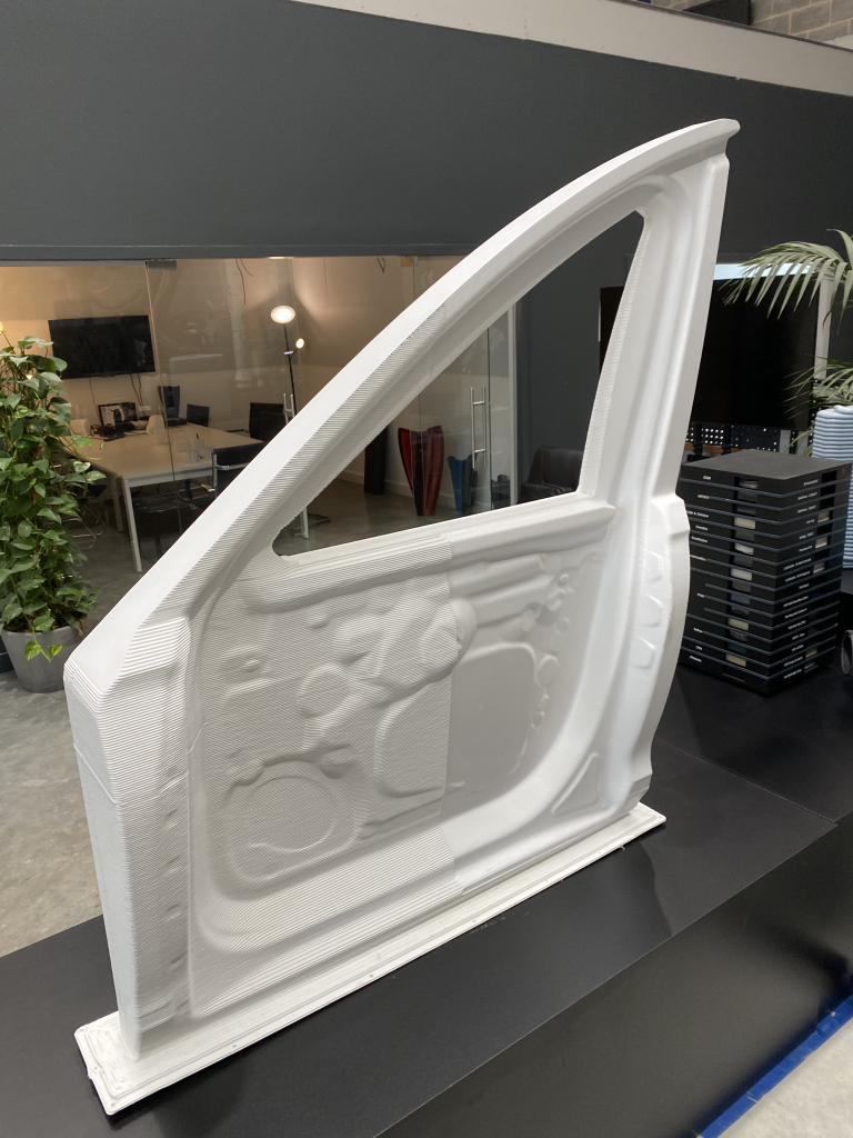 Automotive part 3D printed using AiSync. Photo by 3D Printing Industry.