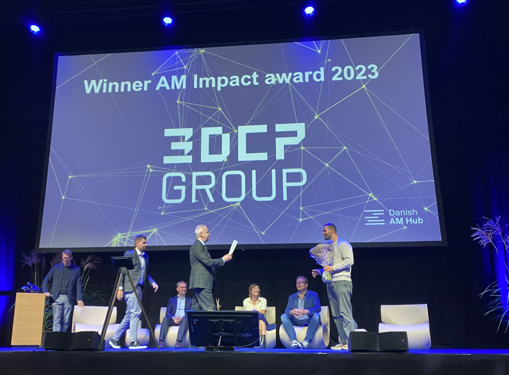 3DCP Group were awarded the AM Impact award at AM Summit 2023. Photo by 3D Printing Industry.