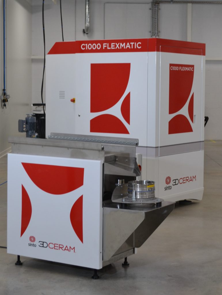 C1000 FLEXMATIC printer and the recycling station. Photo via 3DCeram.