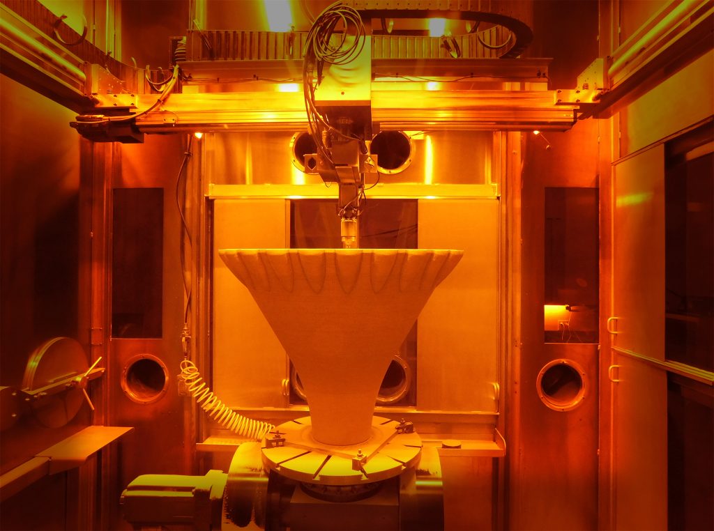 3D printing the RAMFIRE nozzle using LP-DED. Photo via NASA.