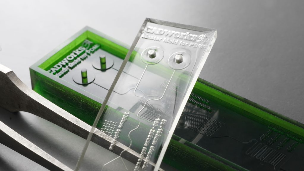 A peeled PDMS device fabricated with CADworks3D’s 3D printed master mold. Photo via CADworks3D.
