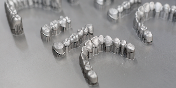 Metal 3D printed dental structures developed using ENAVISION 3D printer. Photo via Ermaksan Additive.