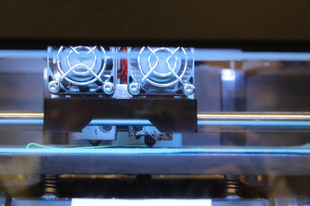 Close-up of a 3D printer in a CIRI emissions chamber. Photo via CIRI.