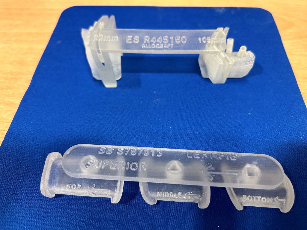 3D printed tailored surgical guides. Photo via Stratasys.