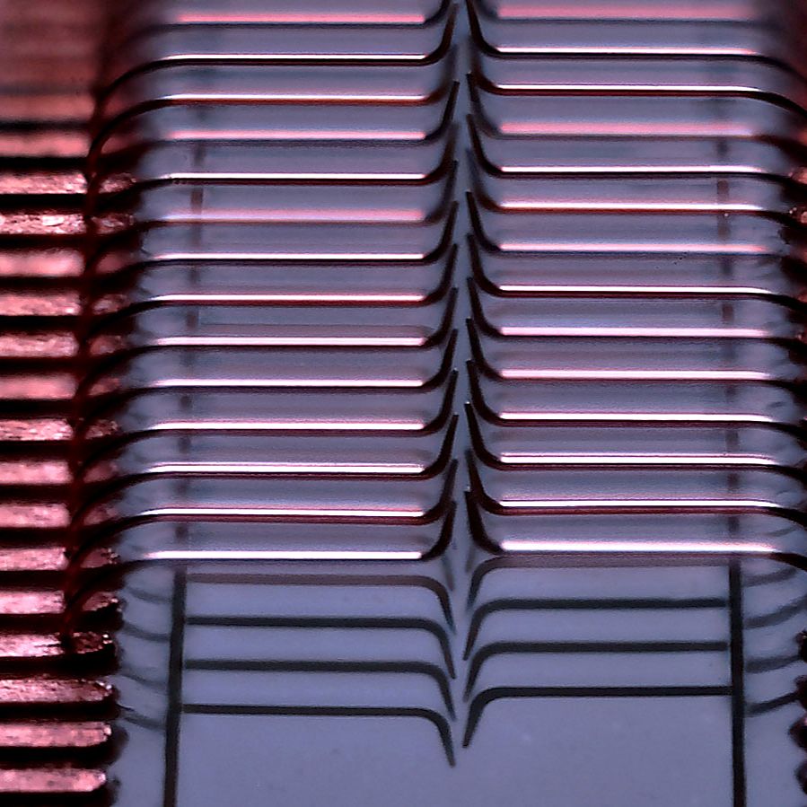 Optical micrograph of Exaddon's 128 probe array, 3D printed directly on contact pads. Image via Exaddon.